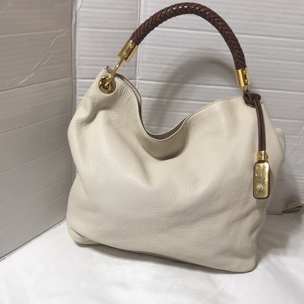 Michael kors Skorpios pebble leather with braided strap. EUC